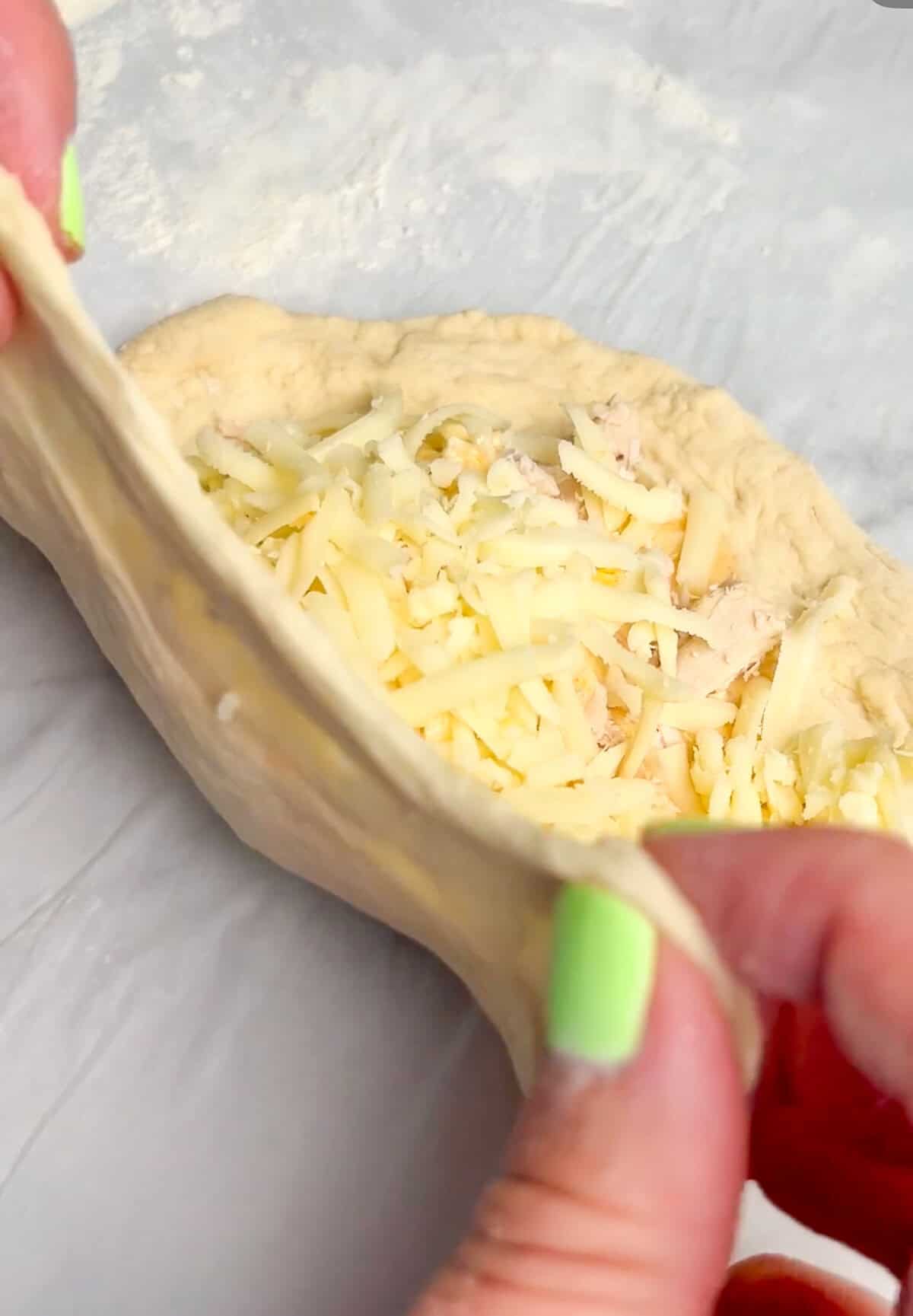 Pockets of dough are stuffed with your favorite pizza toppings, sauce, and cheese in these super easy Air Fryer Calzones. F