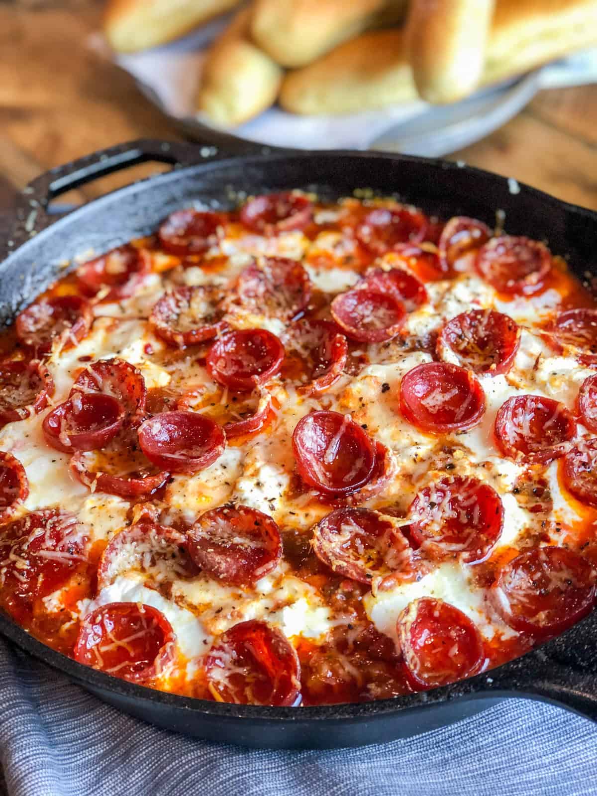 Meat Lover's Pizza Dip in a cast iron skillet