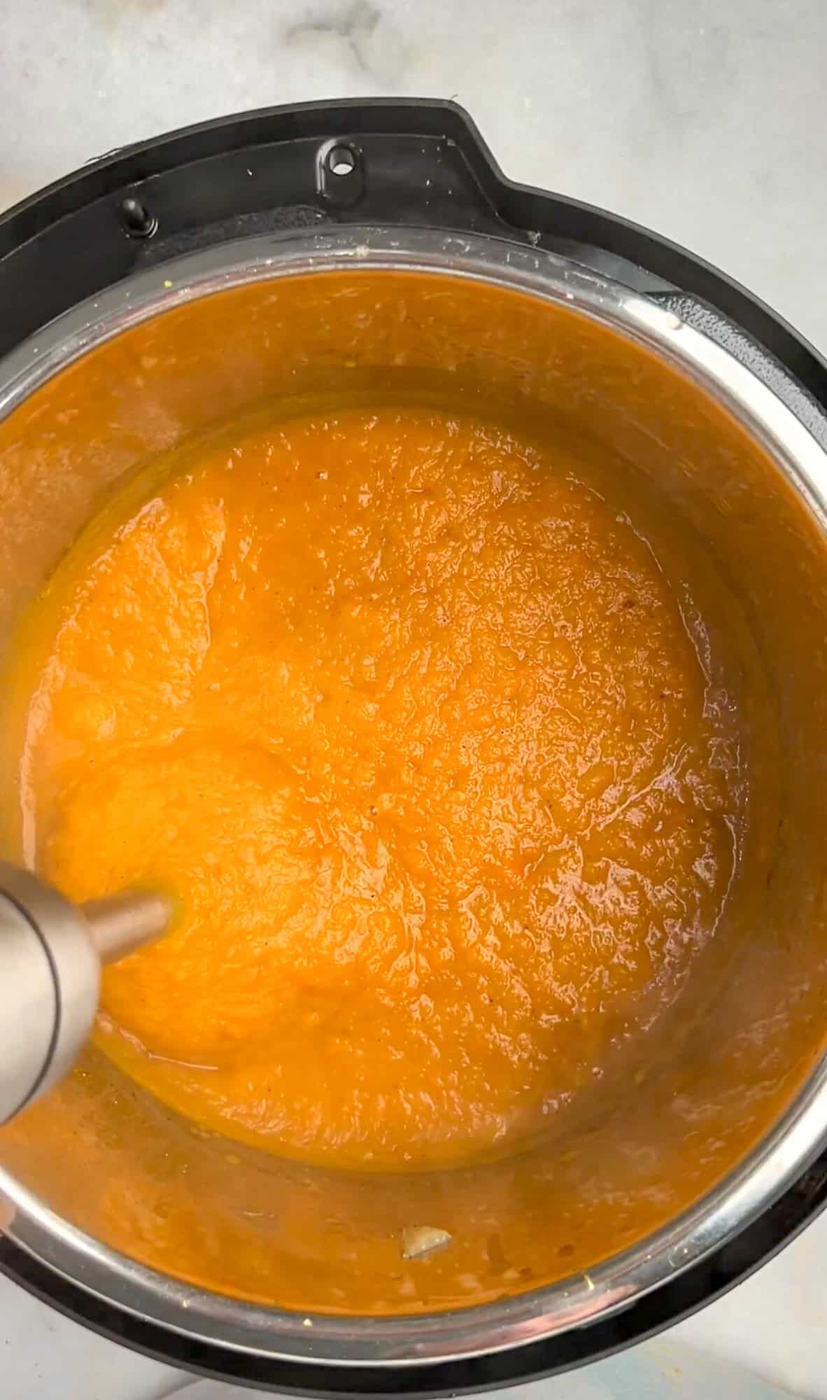 With rich, buttery flavor, warm spices, and a velvety smooth texture, this Copycat Panera Autumn Squash Soup tastes just like the restaurant! An immersion blender pureeing squash and carrots