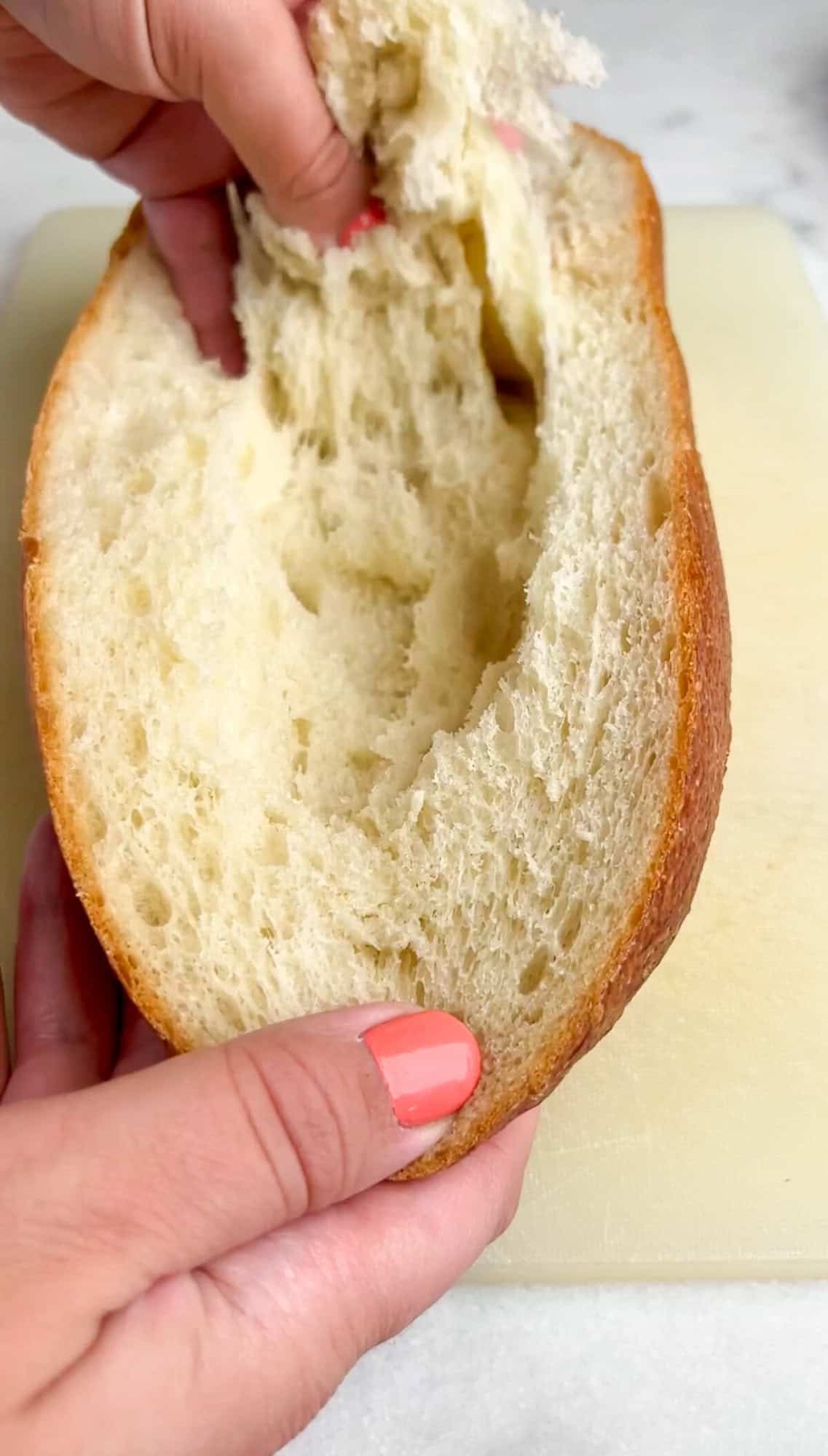 Crusty French bread is topped with sauce, cheese, and any toppings of choice, and then baked in this French Bread Pizza recipe. Pulling out the center of sliced French bread