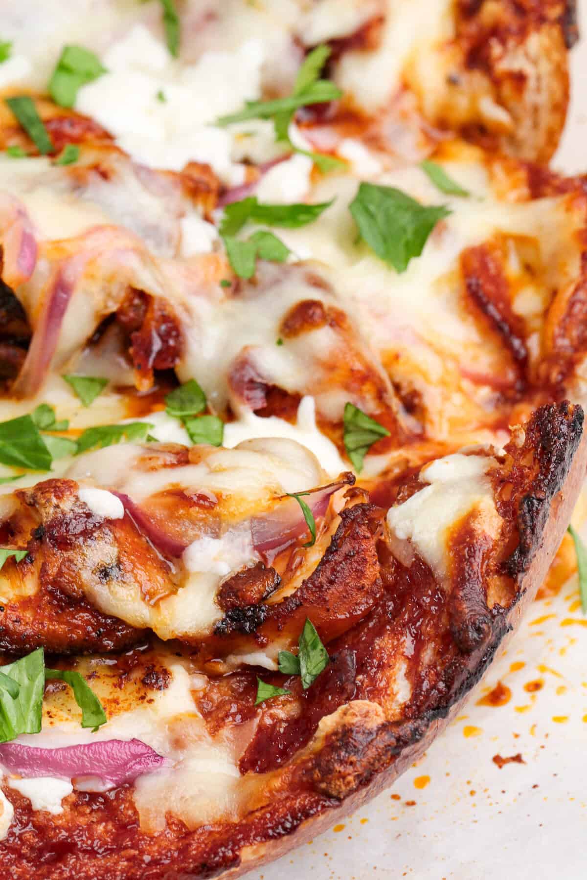 Close up of BBQ chicken French bread pizza