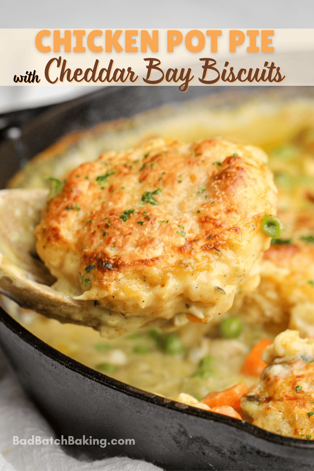 chicken pot pie cheddar bay biscuits in a skillet