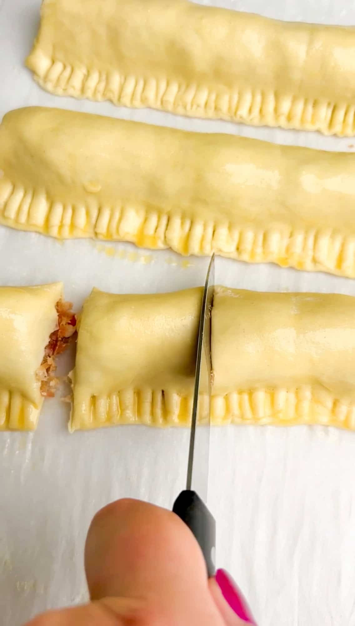 Slice the sausage rolls into portions