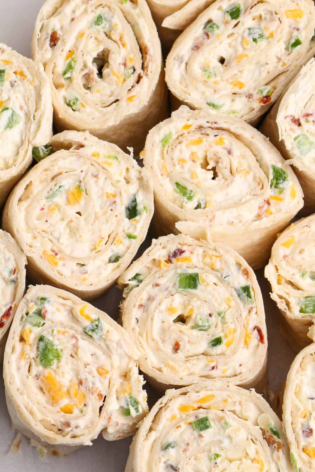 Pinwheel Shells Jalapeno Popper Toasted Pinwheel Sandwiches - Bad Batch Baking