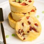 Three copycat Starbucks egg bites stacked on each other with one leaning against them