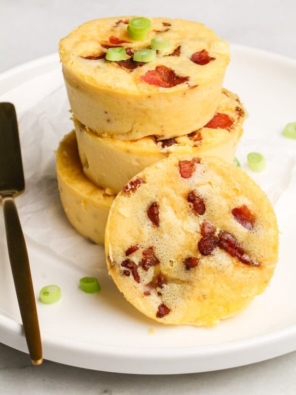 Three copycat Starbucks egg bites stacked on each other with one leaning against them