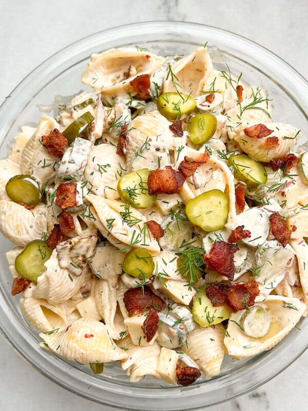 Overhead view of a bowl of dill pickle pasta salad