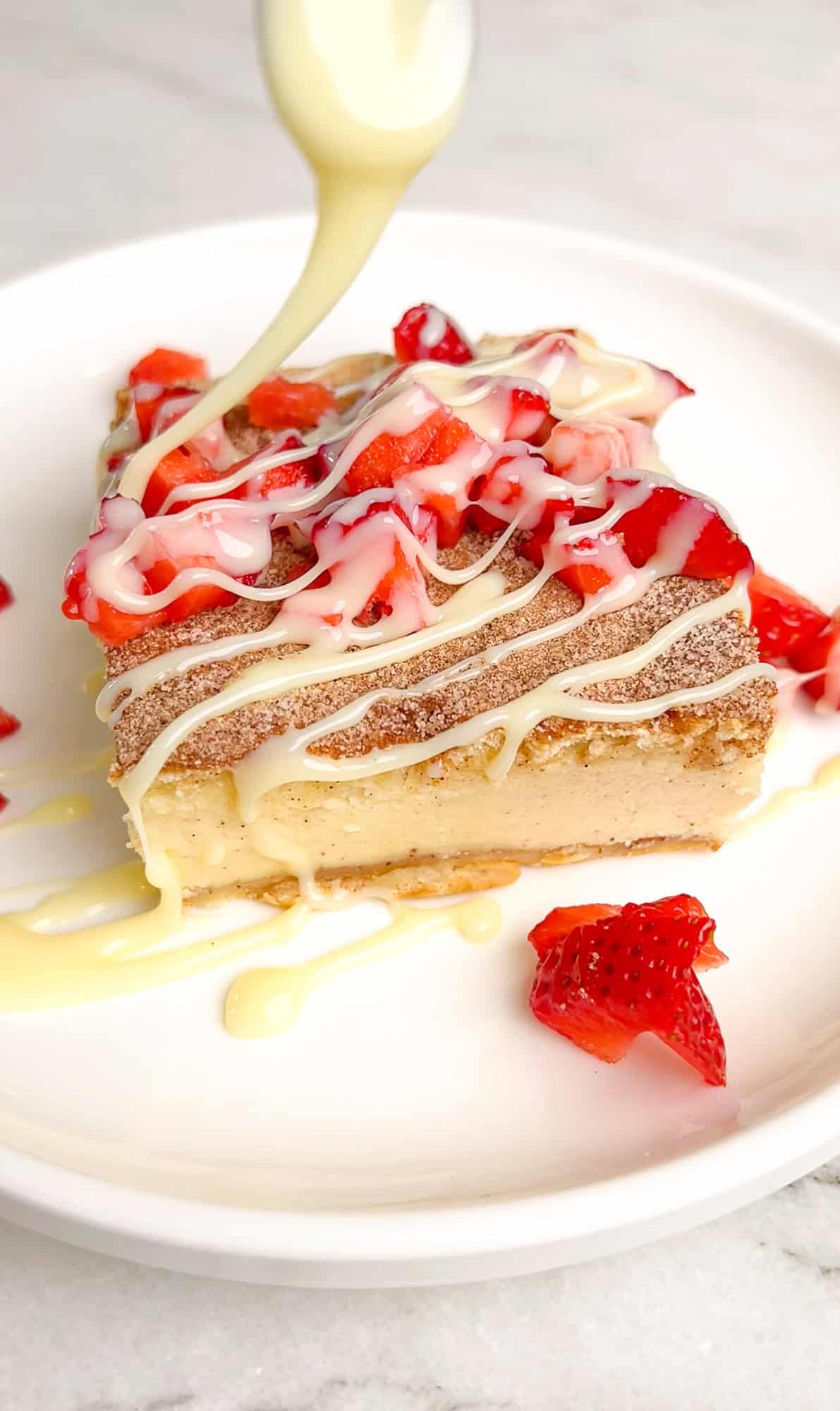 Crescent rolls form the crust of this churro cheesecake, while a creamy cinnamon sugar filling adds the churro flavor. Super easy! Drizzling sweetened condensed milk over churro cheesecake