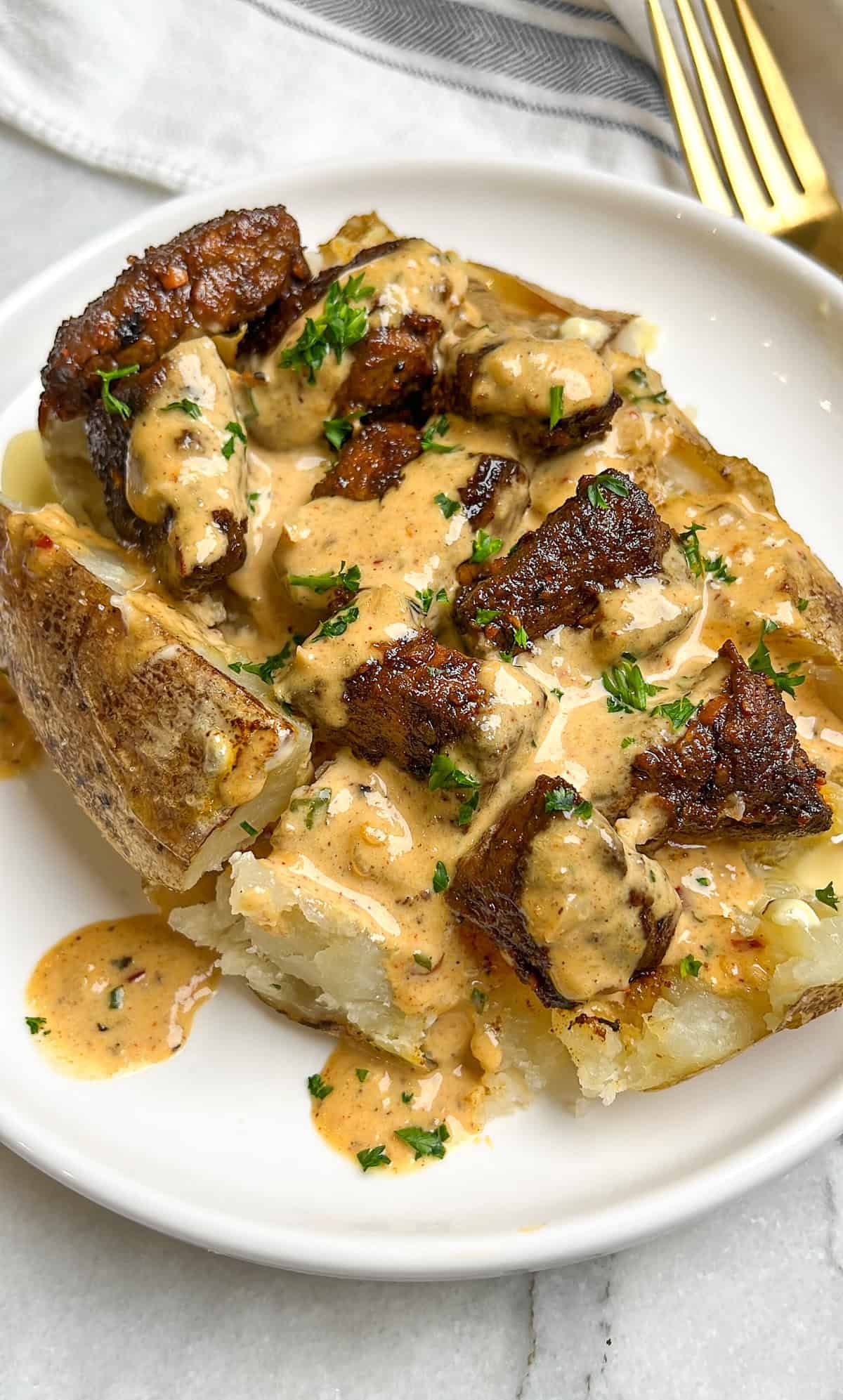 loaded baked potatoes with steak