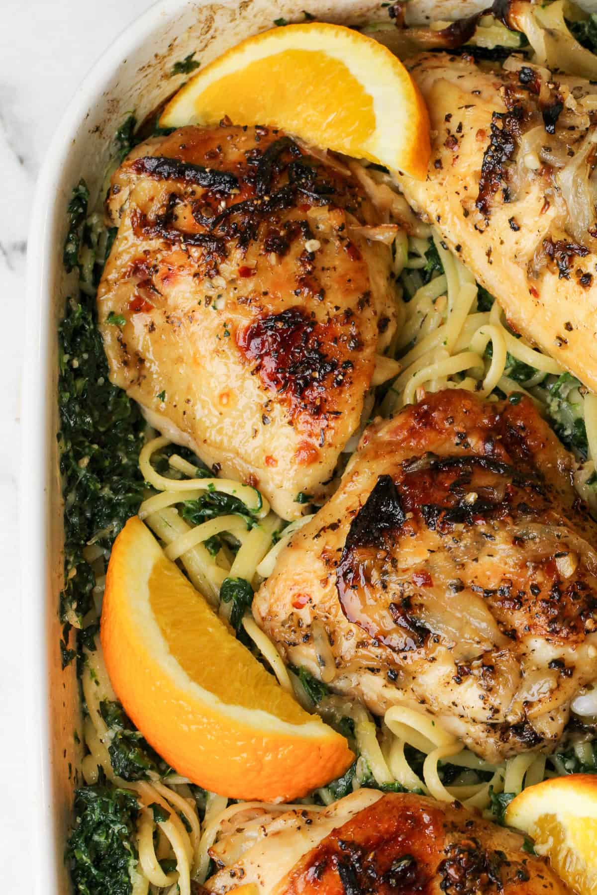 baked chicken over linguini