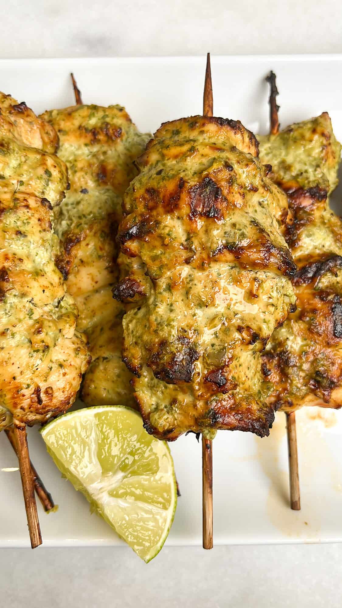 chicken skewers on a plate