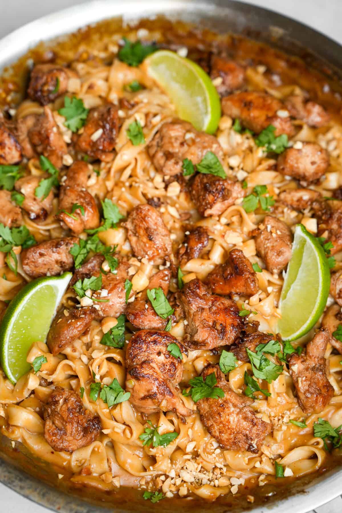 peanut sauce with noodles, lime and chicken