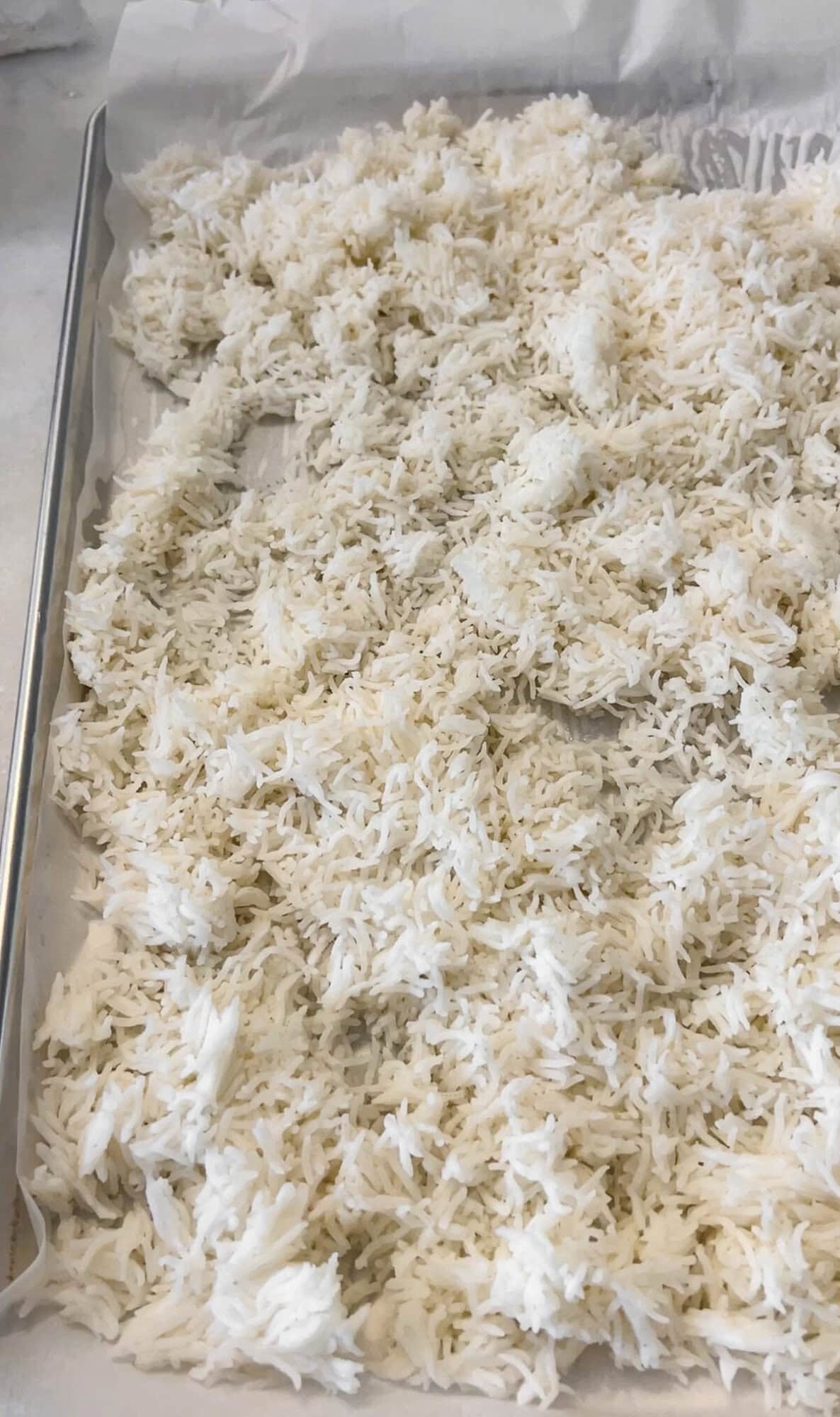 rice cooling on a pan