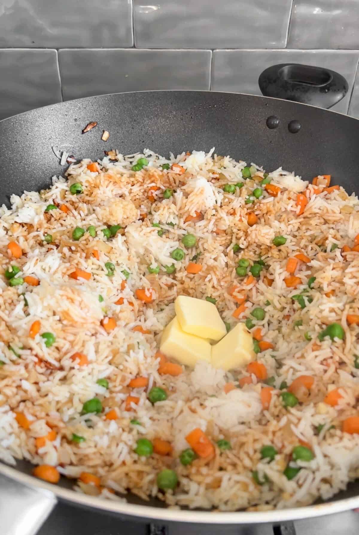 mango chicken fried rice in a wok