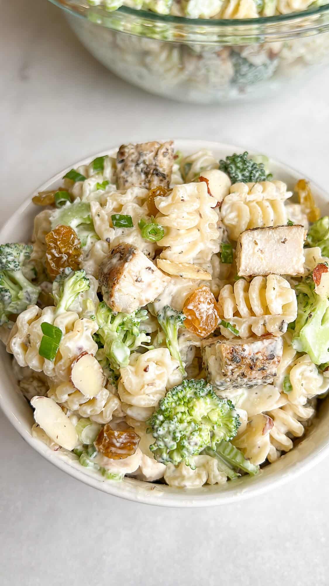 broccoli chicken pasta salad in a bowl