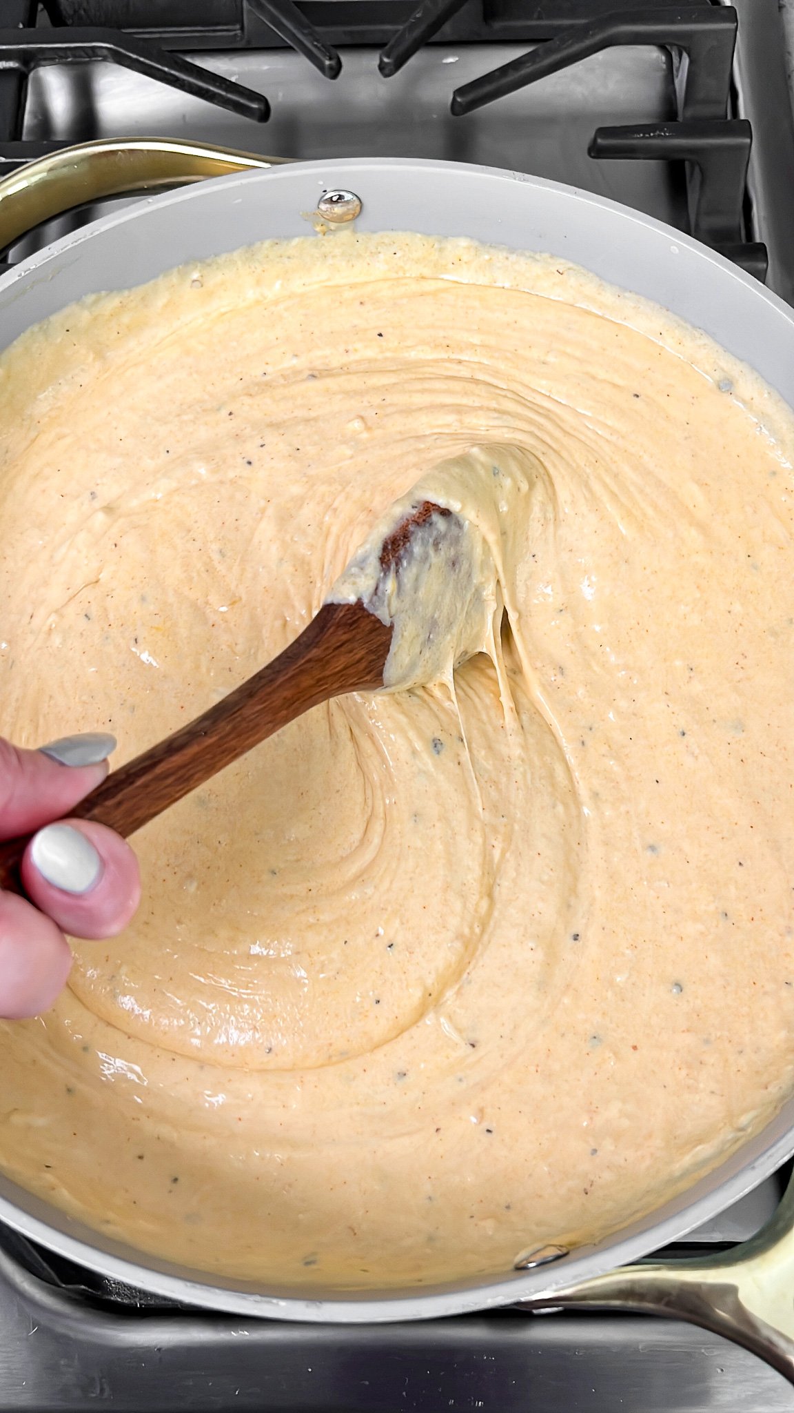 the finished cheesy sauce in a pan