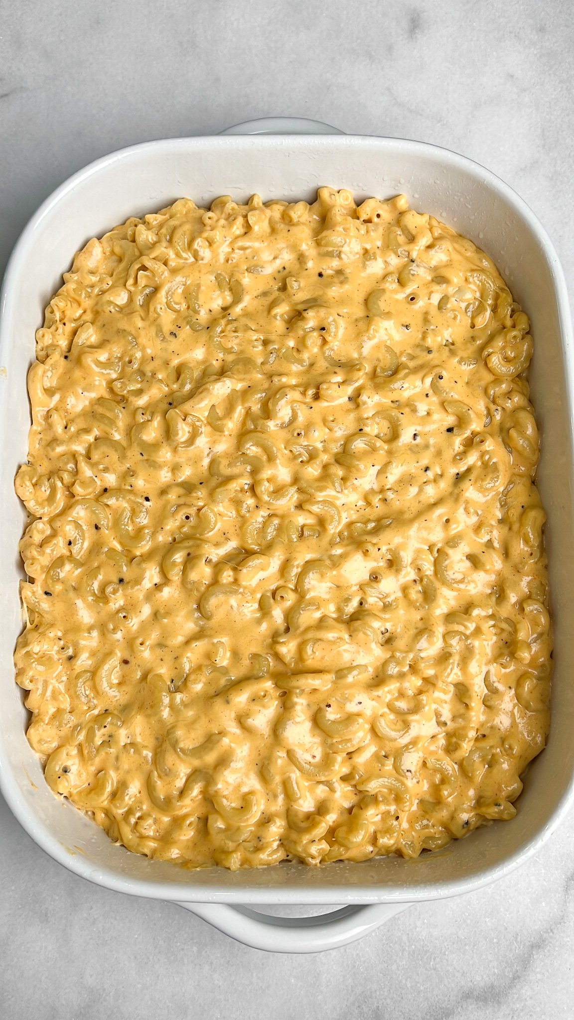 layered of macaroni in a casserole dish