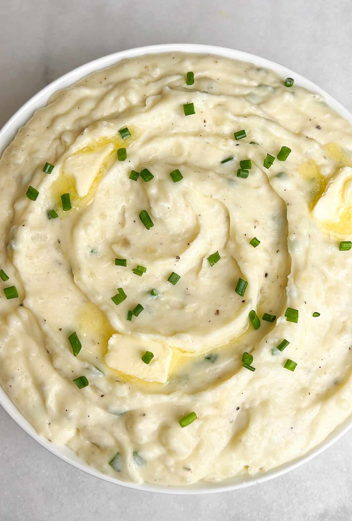 Close overhead view of a bowl of Boursin mashed potatoes