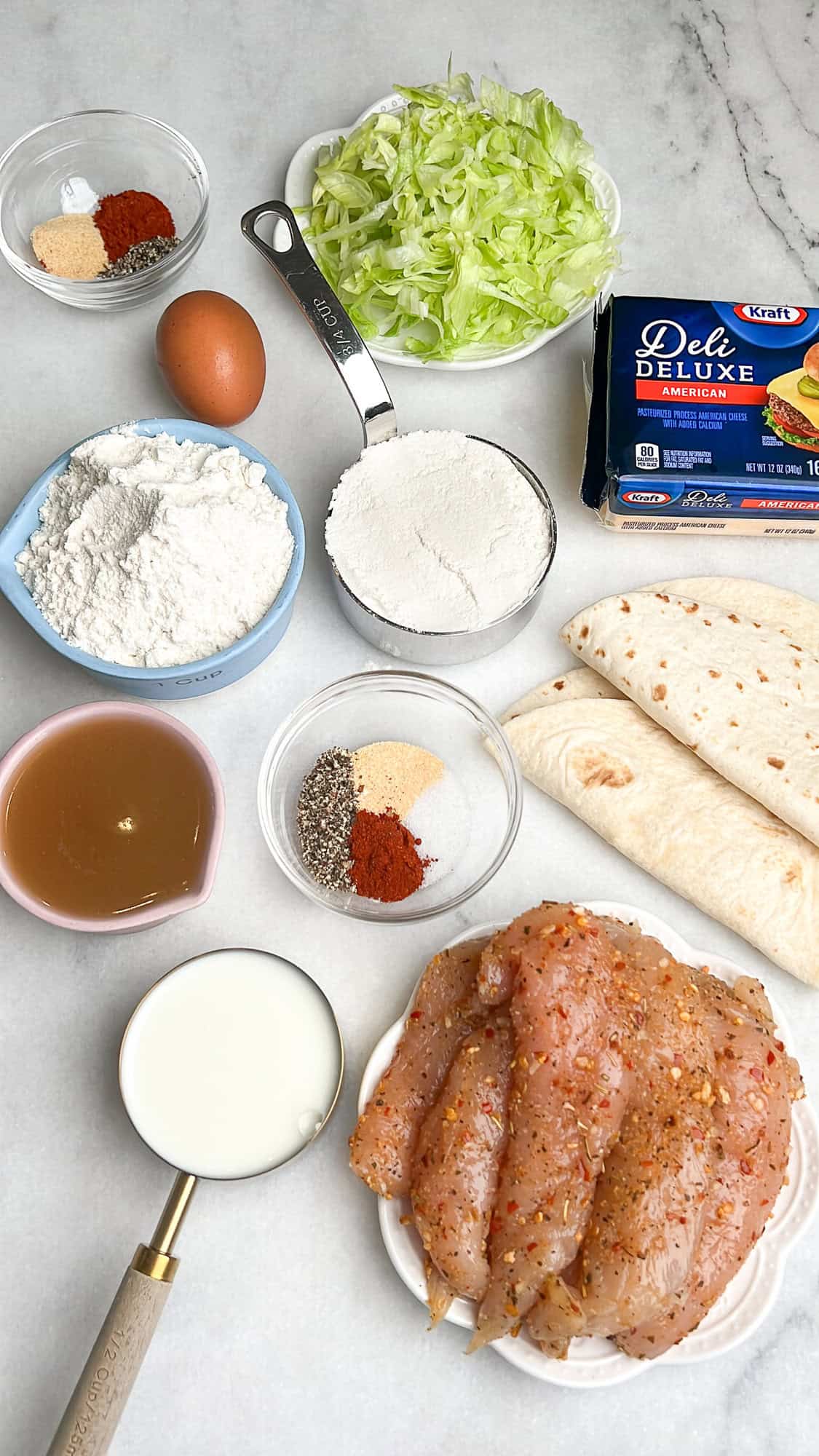 all of the measured ingredients needed for the chicken big mac taco sitting on the counter