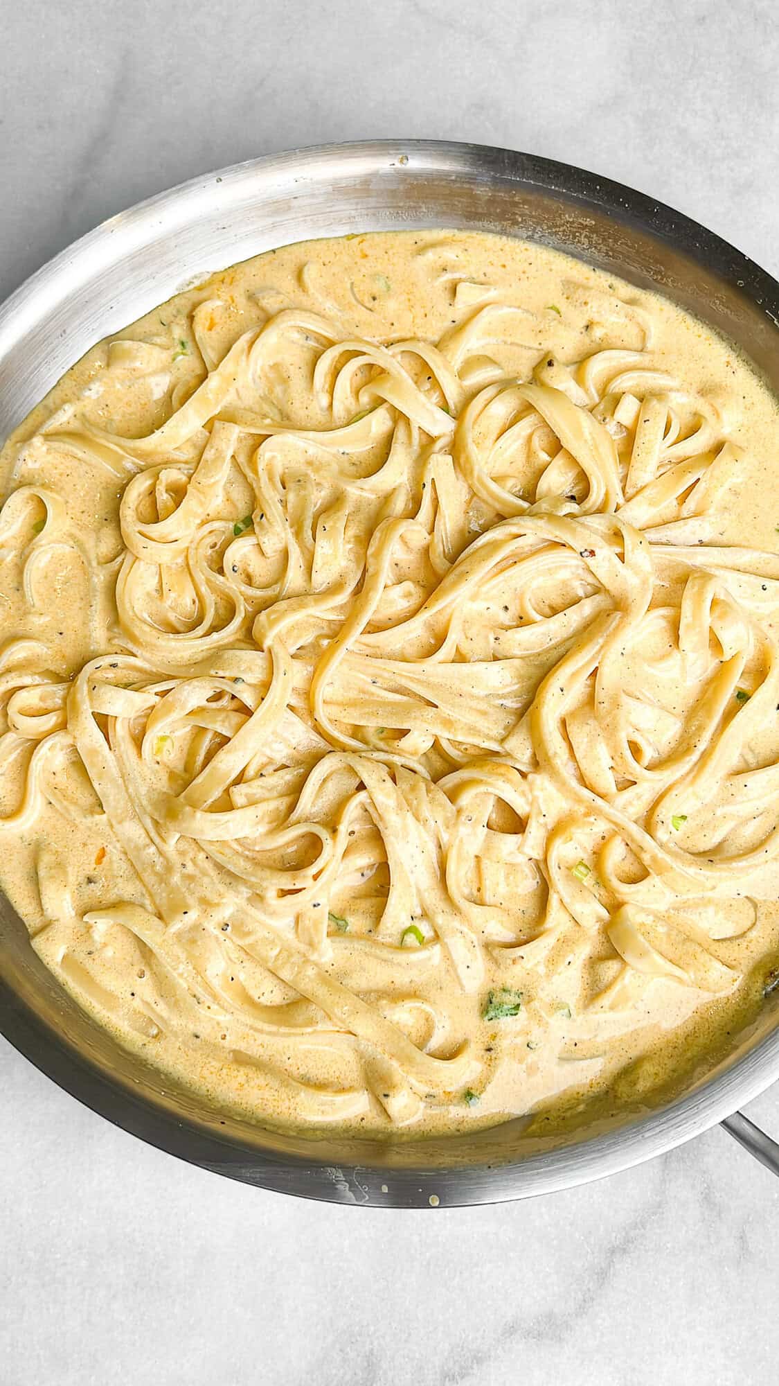 fettuccini alfredo in a pan