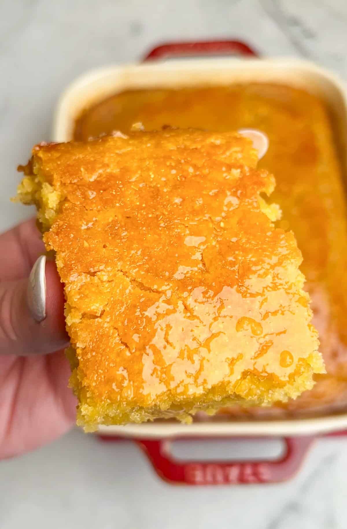 slice of cornbread with honey butter glazed on top