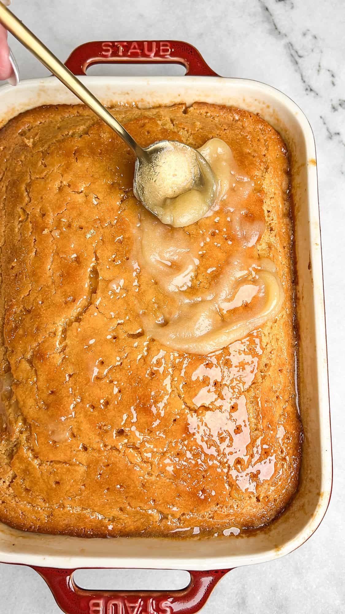 spreading on the honey butter on top of the hot cornbread