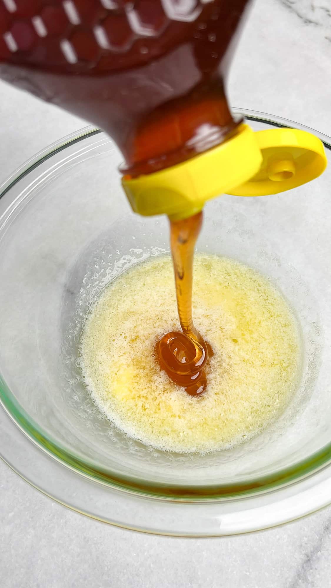 mixing together honey and butter