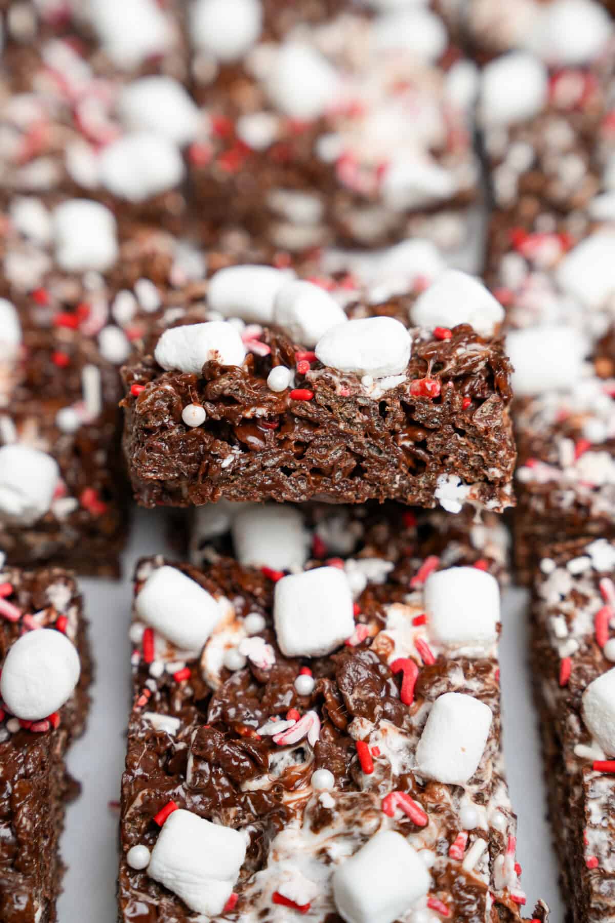 up close texture of chocolate rice krispie treats sliced into squares