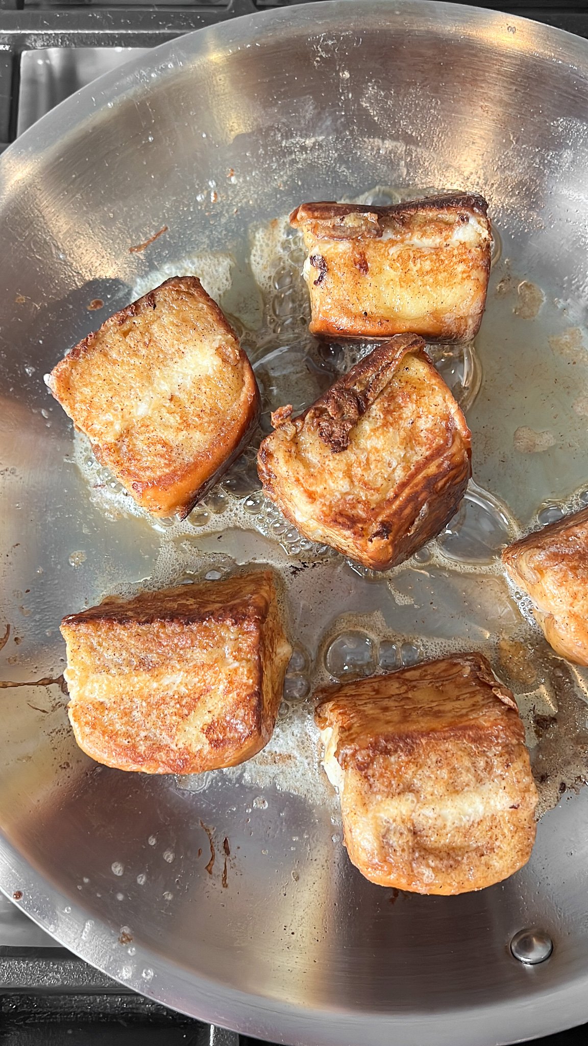 french toast cooking in a skillet