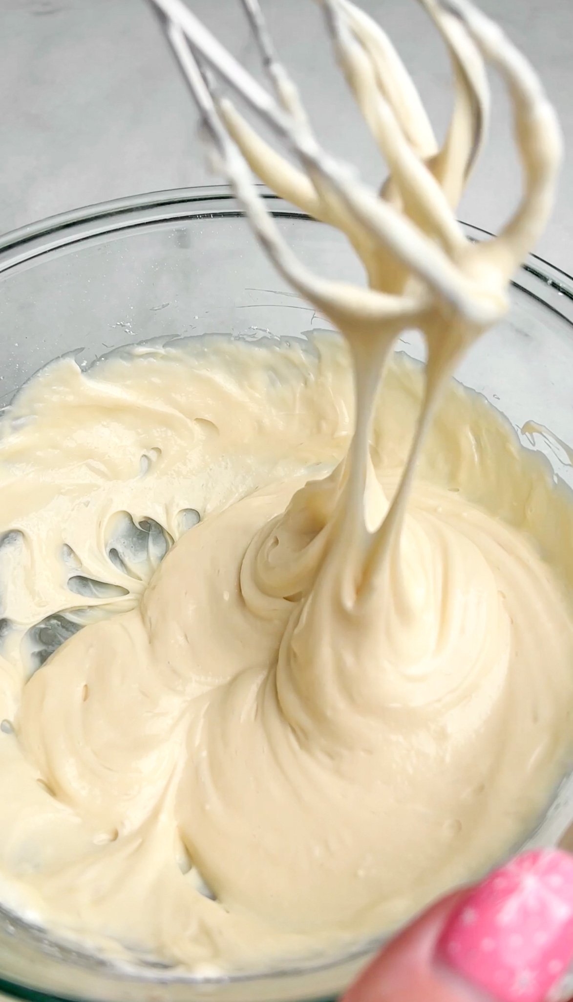 blending the cheesecake filling in a bowl