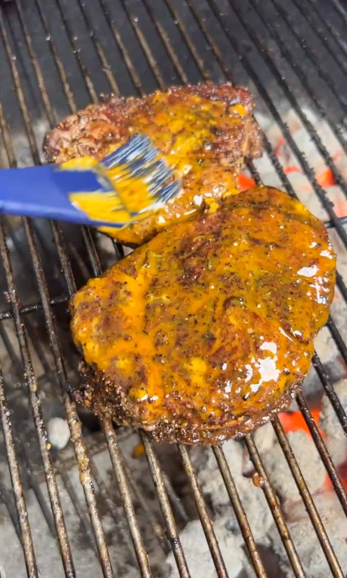 steak being smothered with cowboy butter