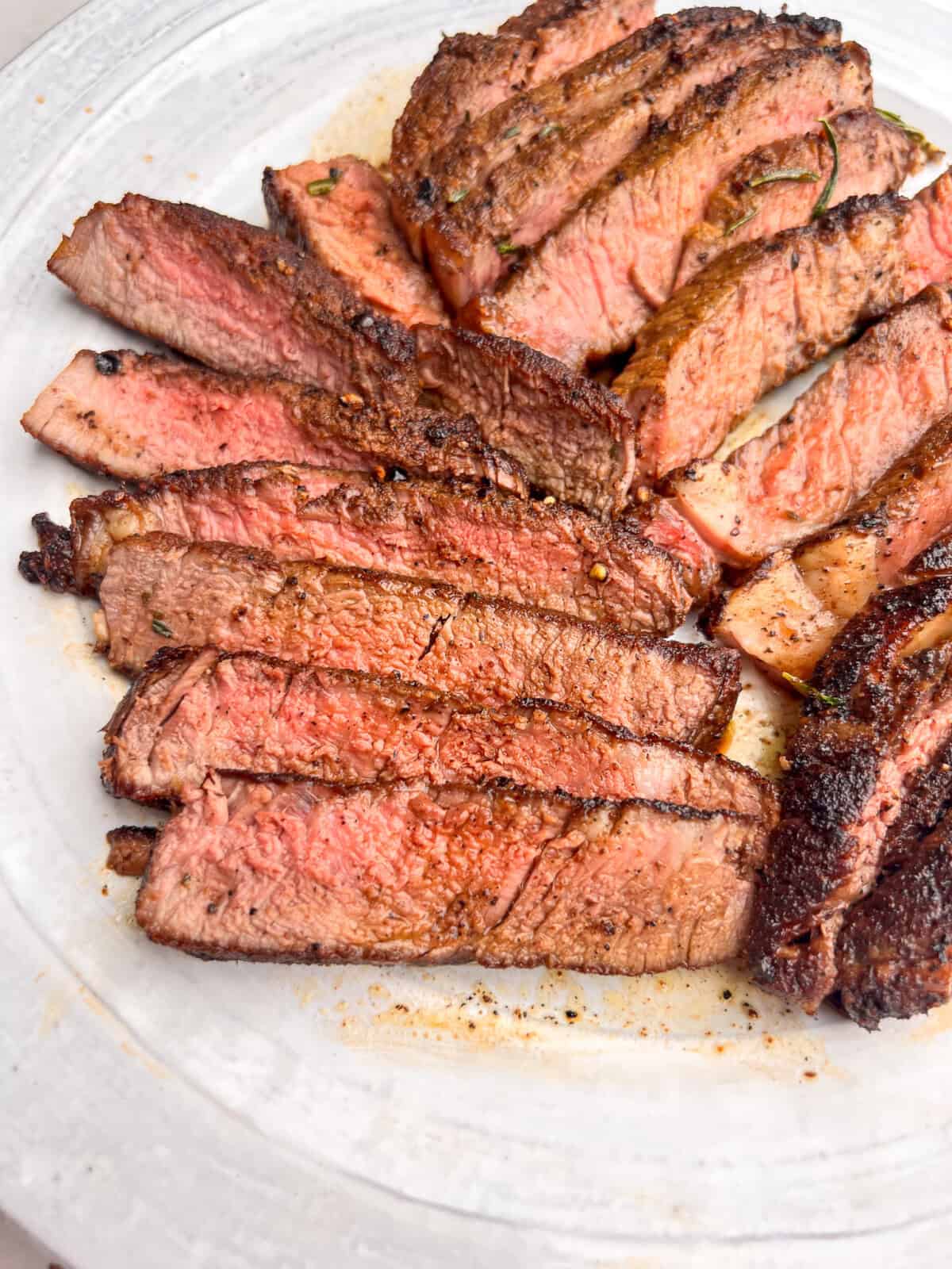 slices of tender steak on a plate