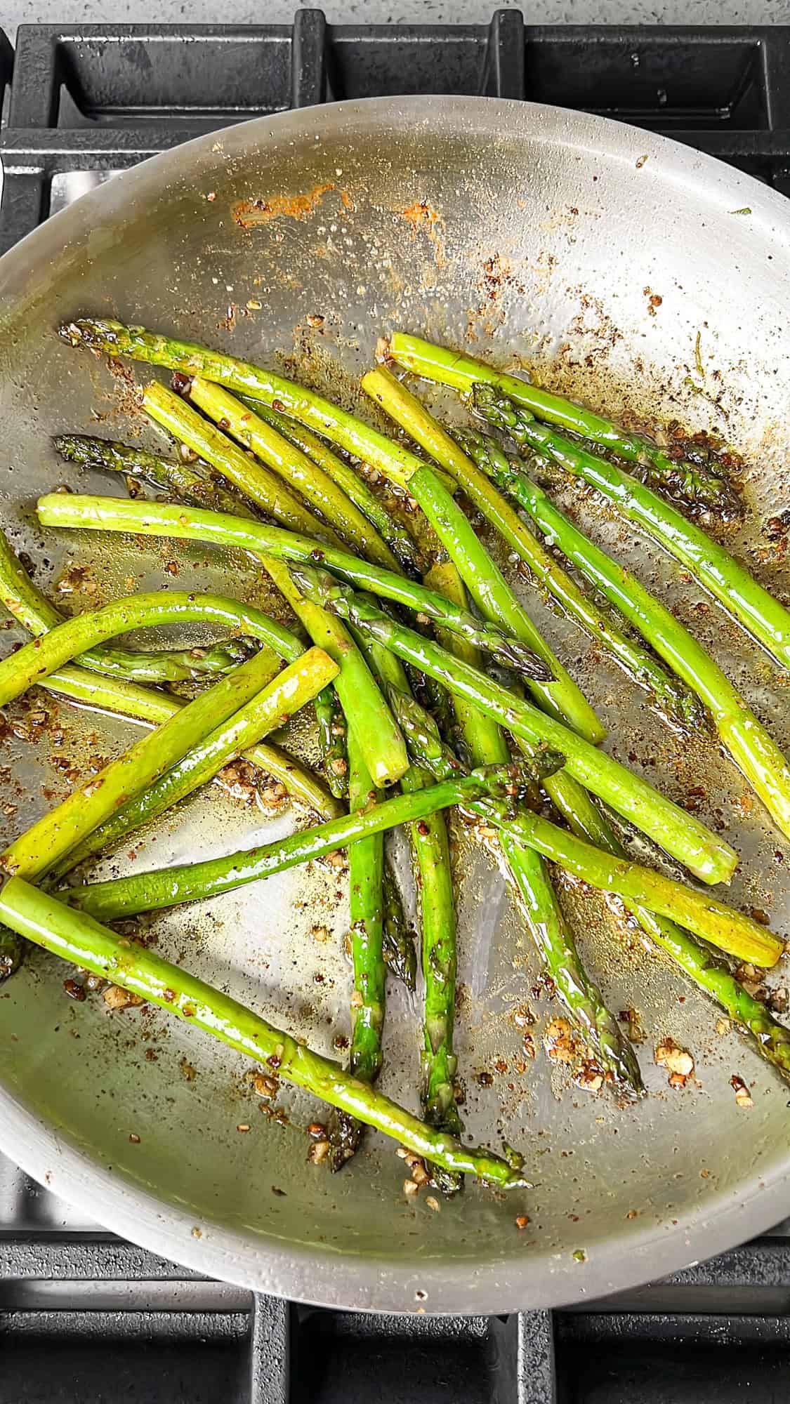 cooked asparagus in a pan