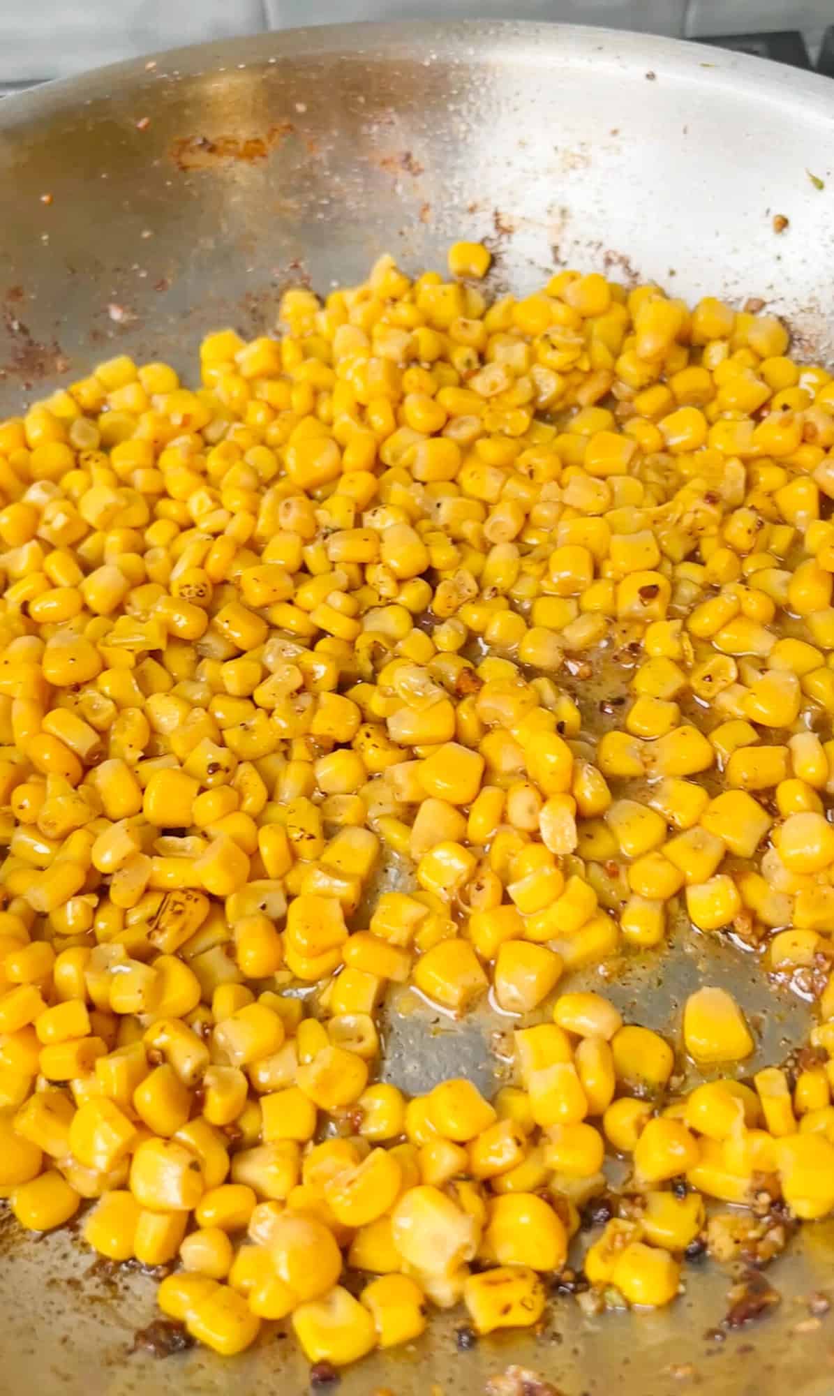 corn cooking in a skillet