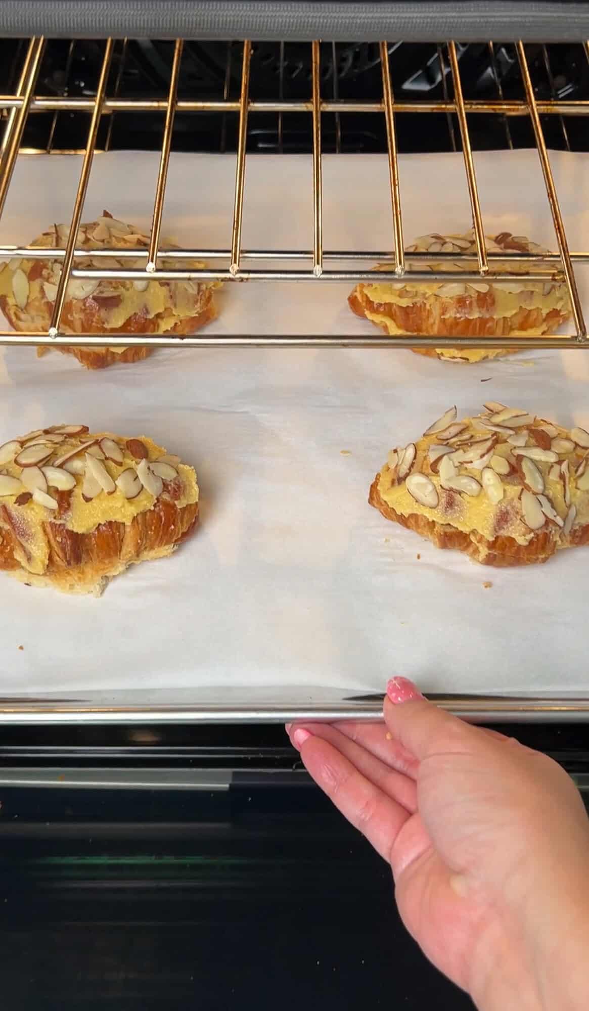 croissants on a pan going in the oven