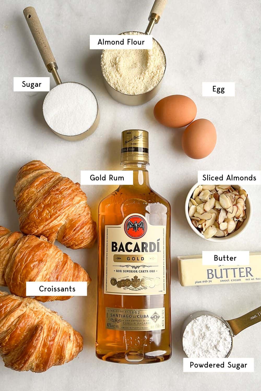 all the measured ingredients needed for almond croissants