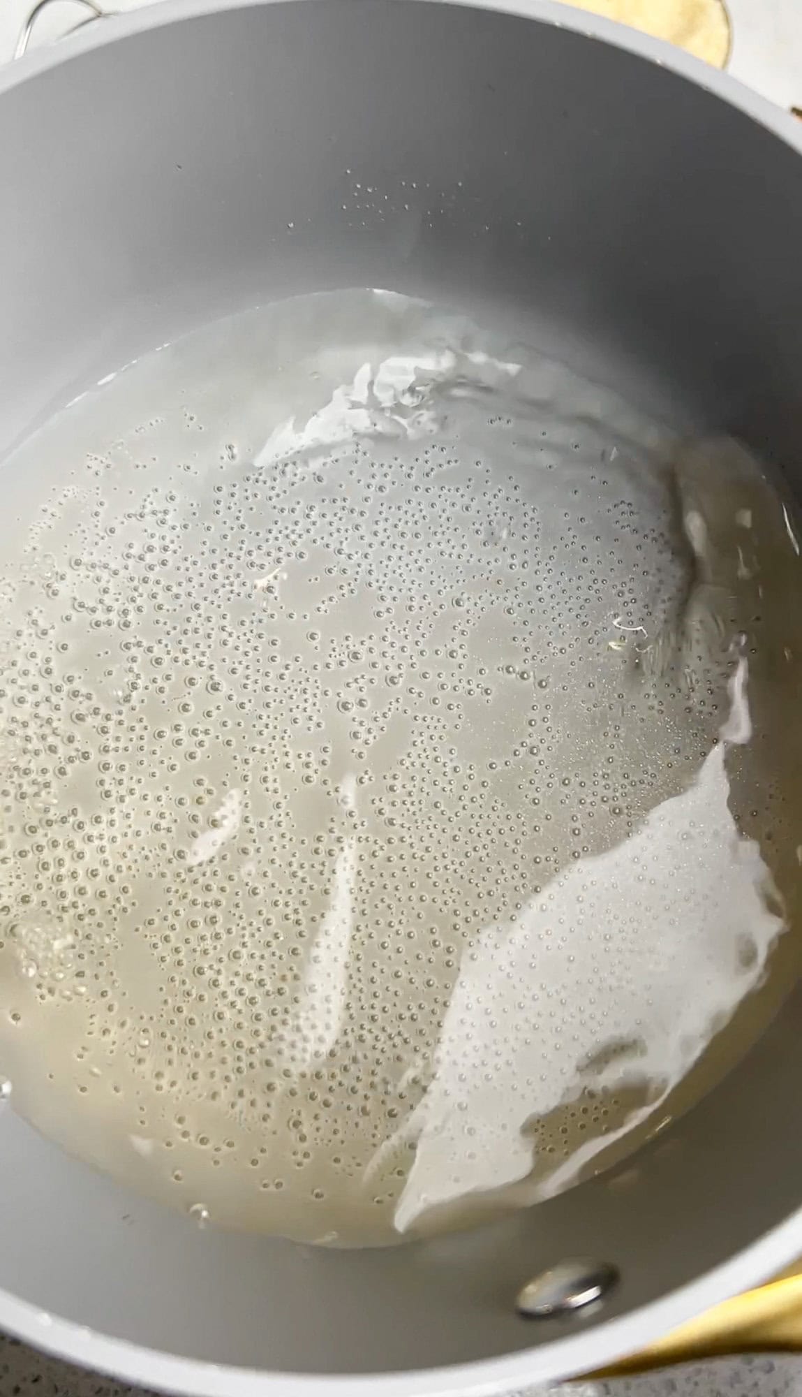 making the simple syrup for the almond croissants