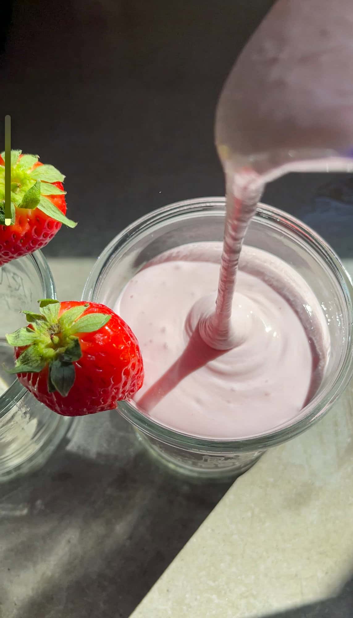 strawberry smoothie in a glass.