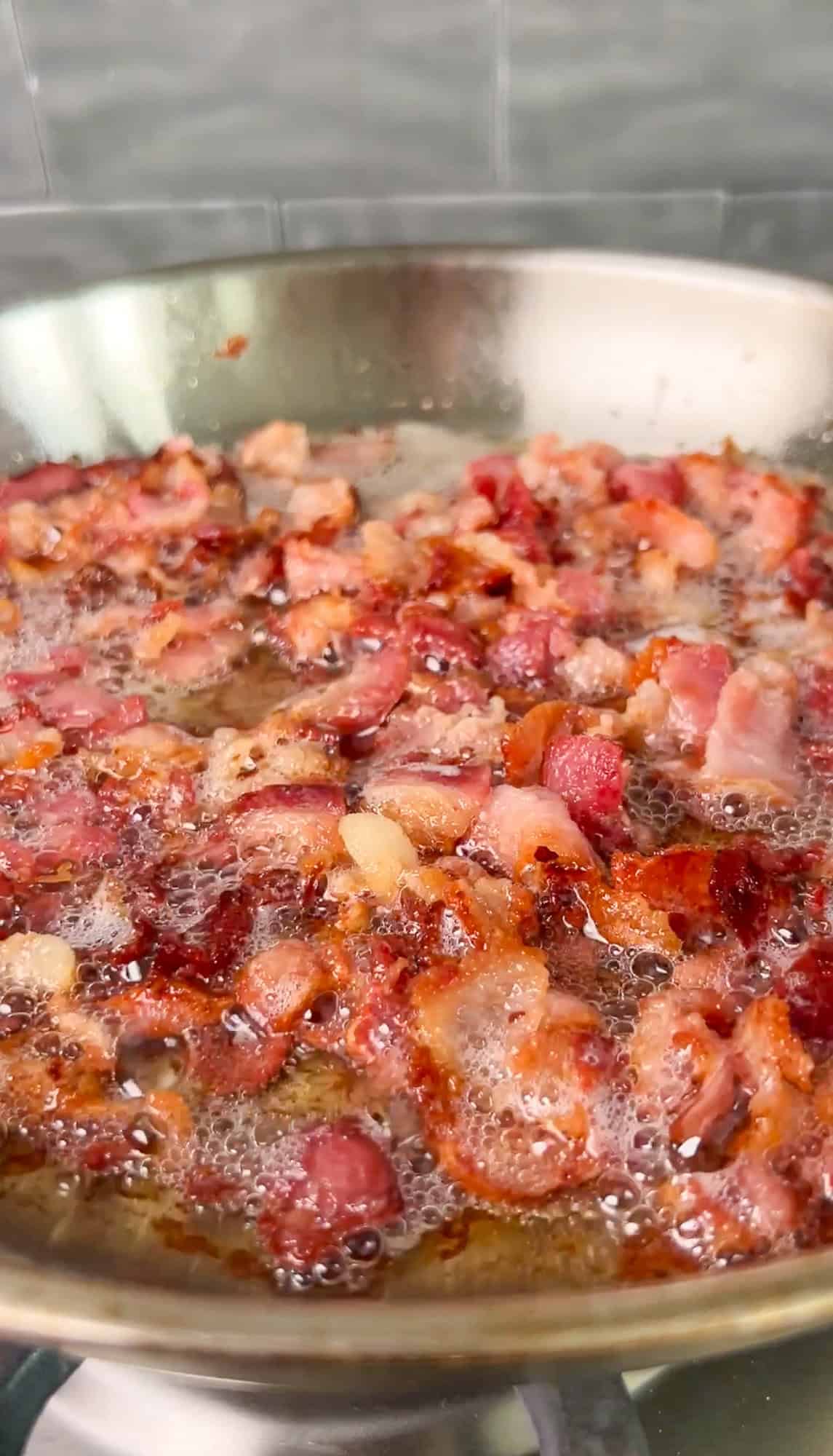 bacon cooking in a pan