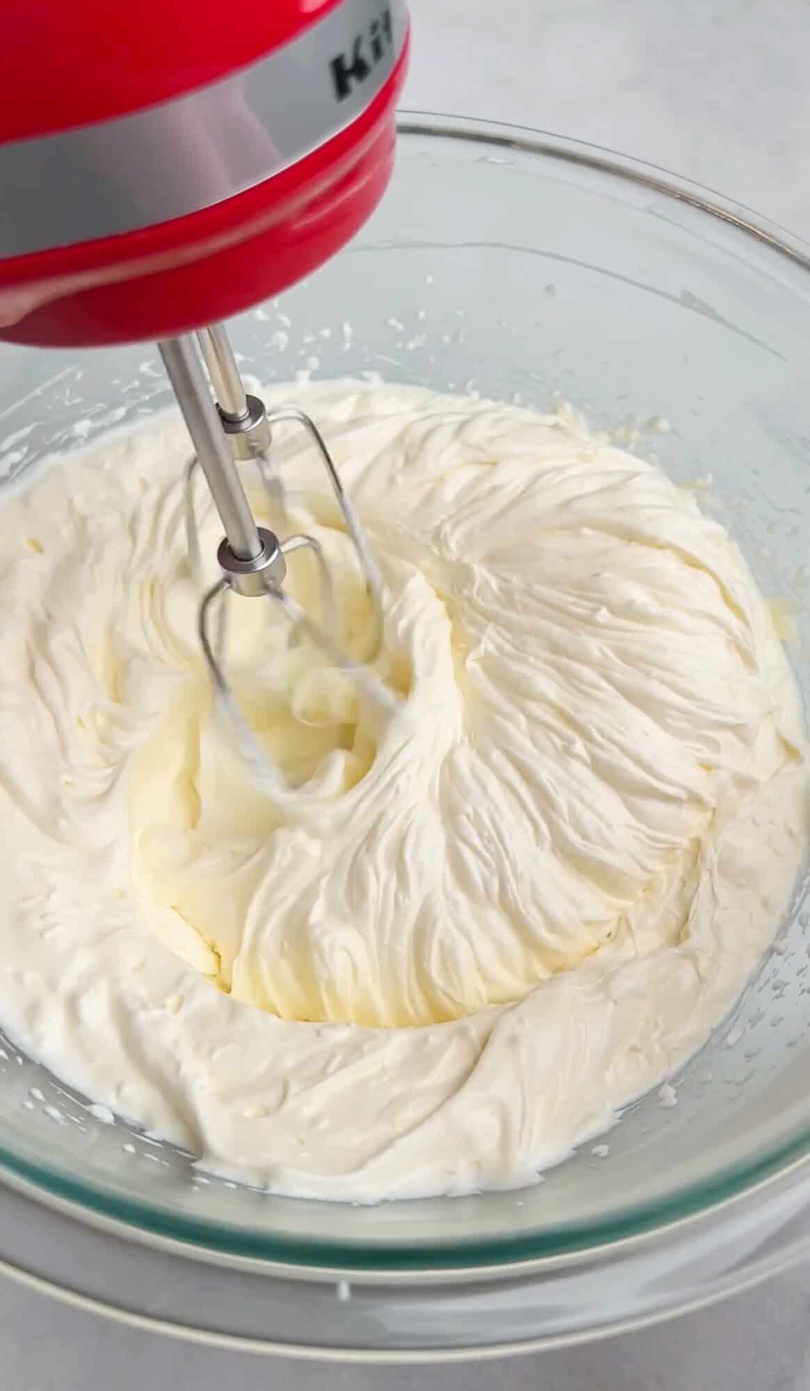 mixing together the creamy base for the dip