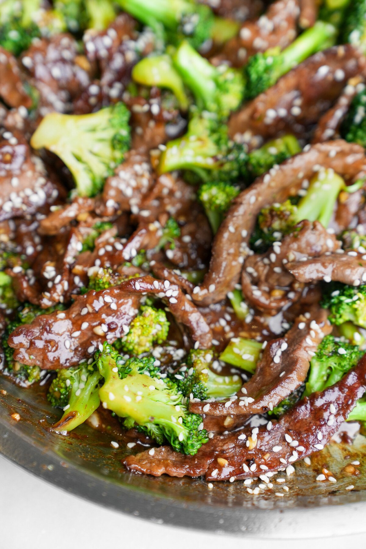 beef and broccoli in a pan