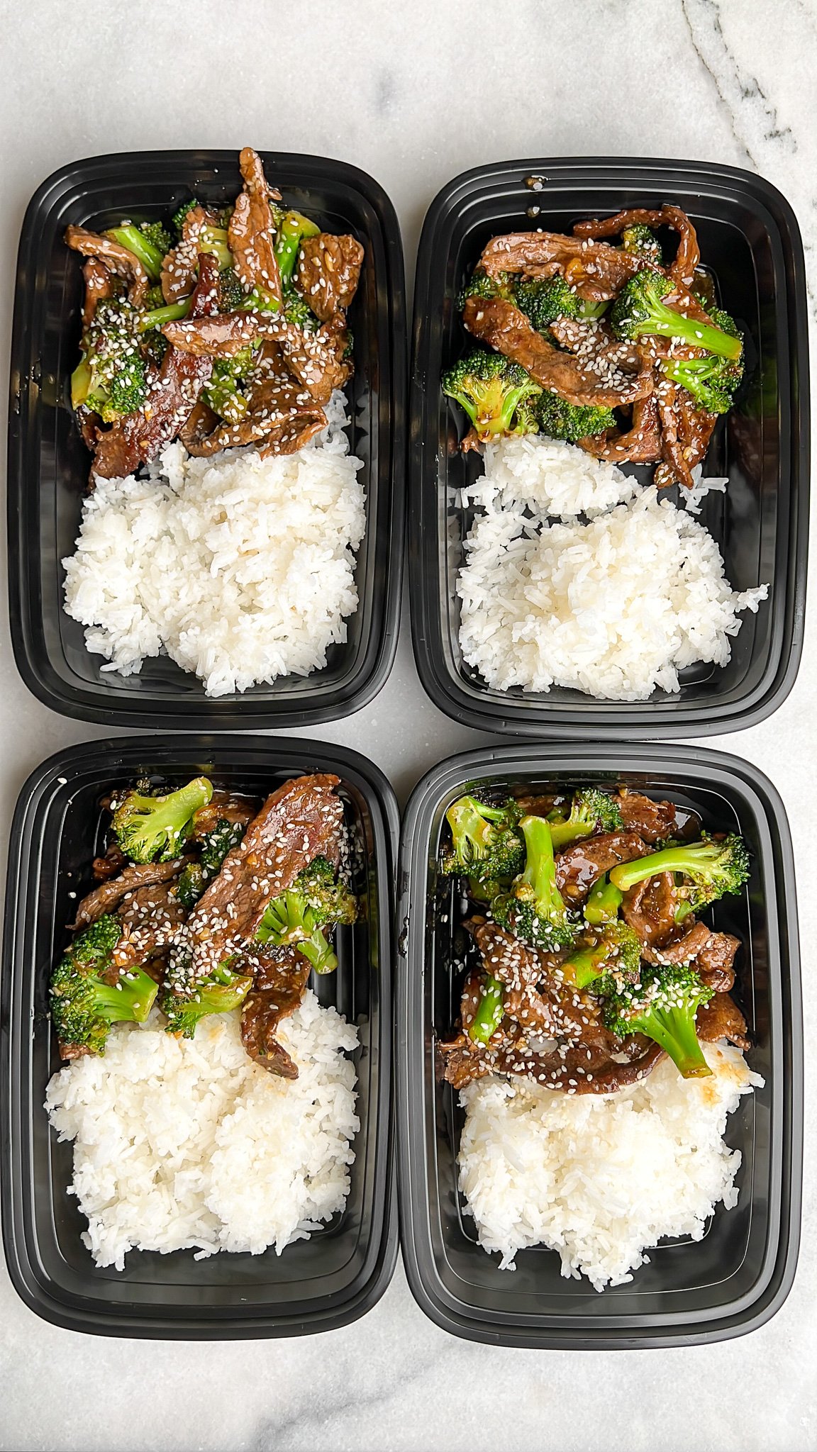 meal prep containers full of beef and broccoli