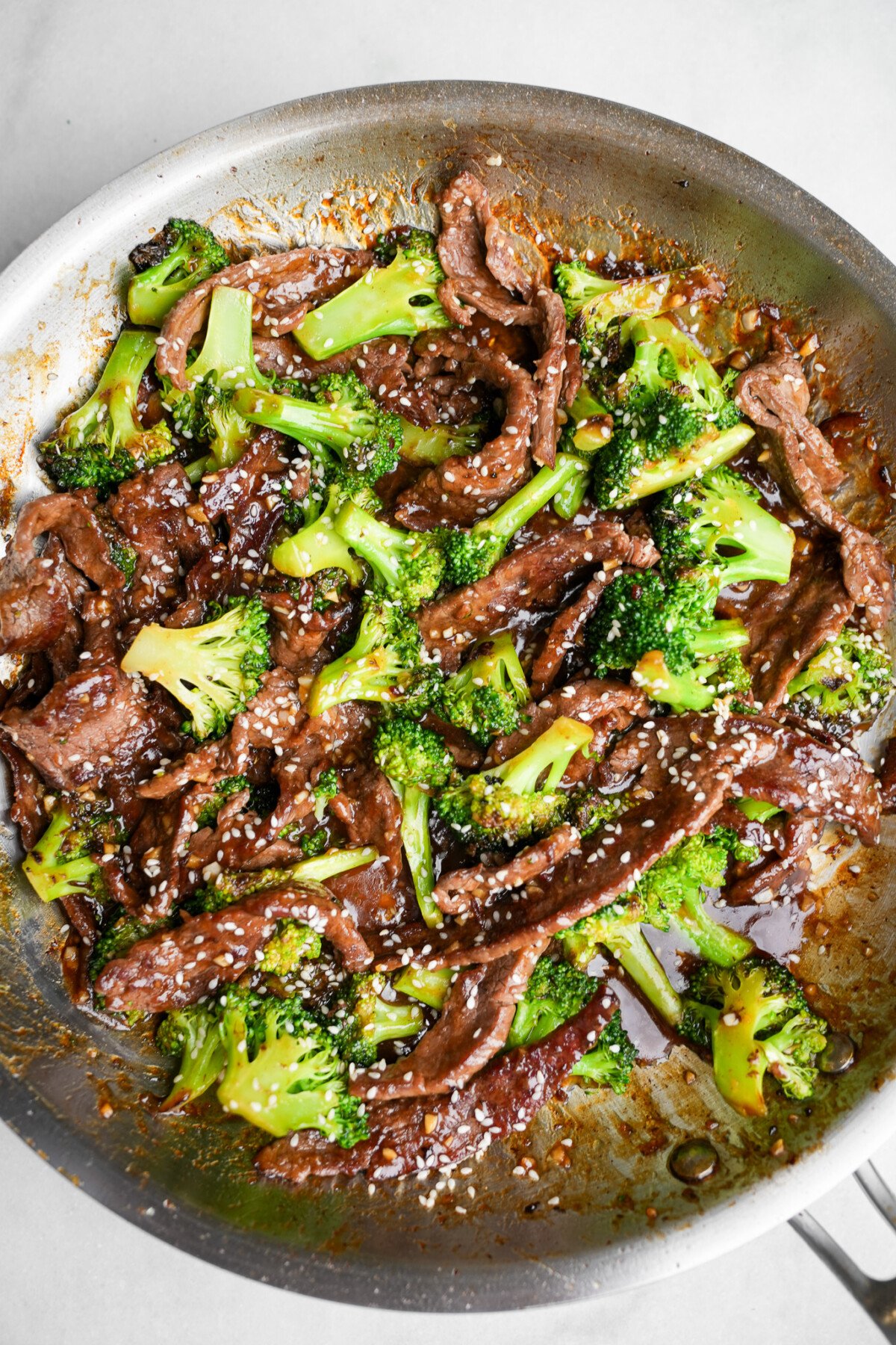 beef and broccoli in a pan