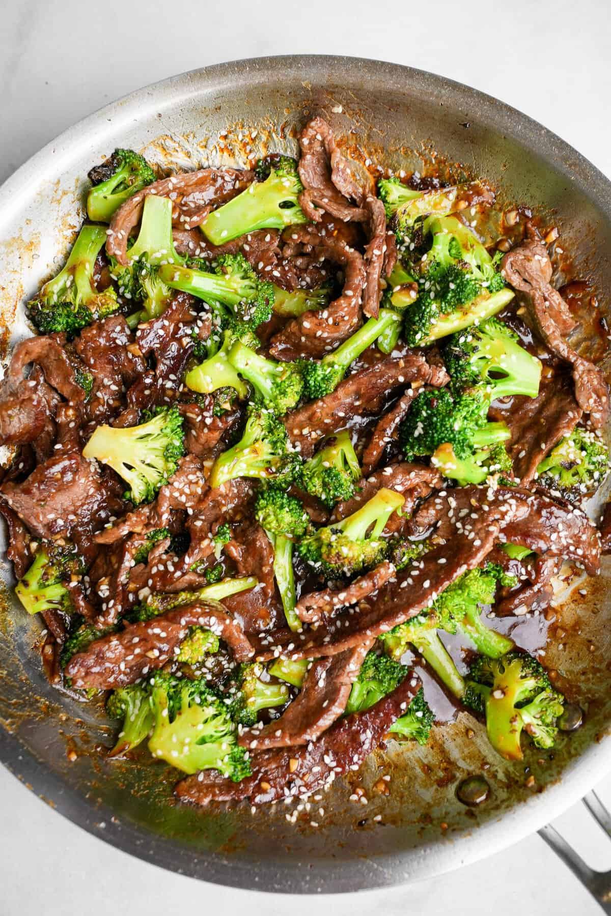 This beef and broccoli recipe is an easy one-pan dinner that's ready in just 20 minutes! It'll rival any Chinese takeout. beef and broccoli in a pan