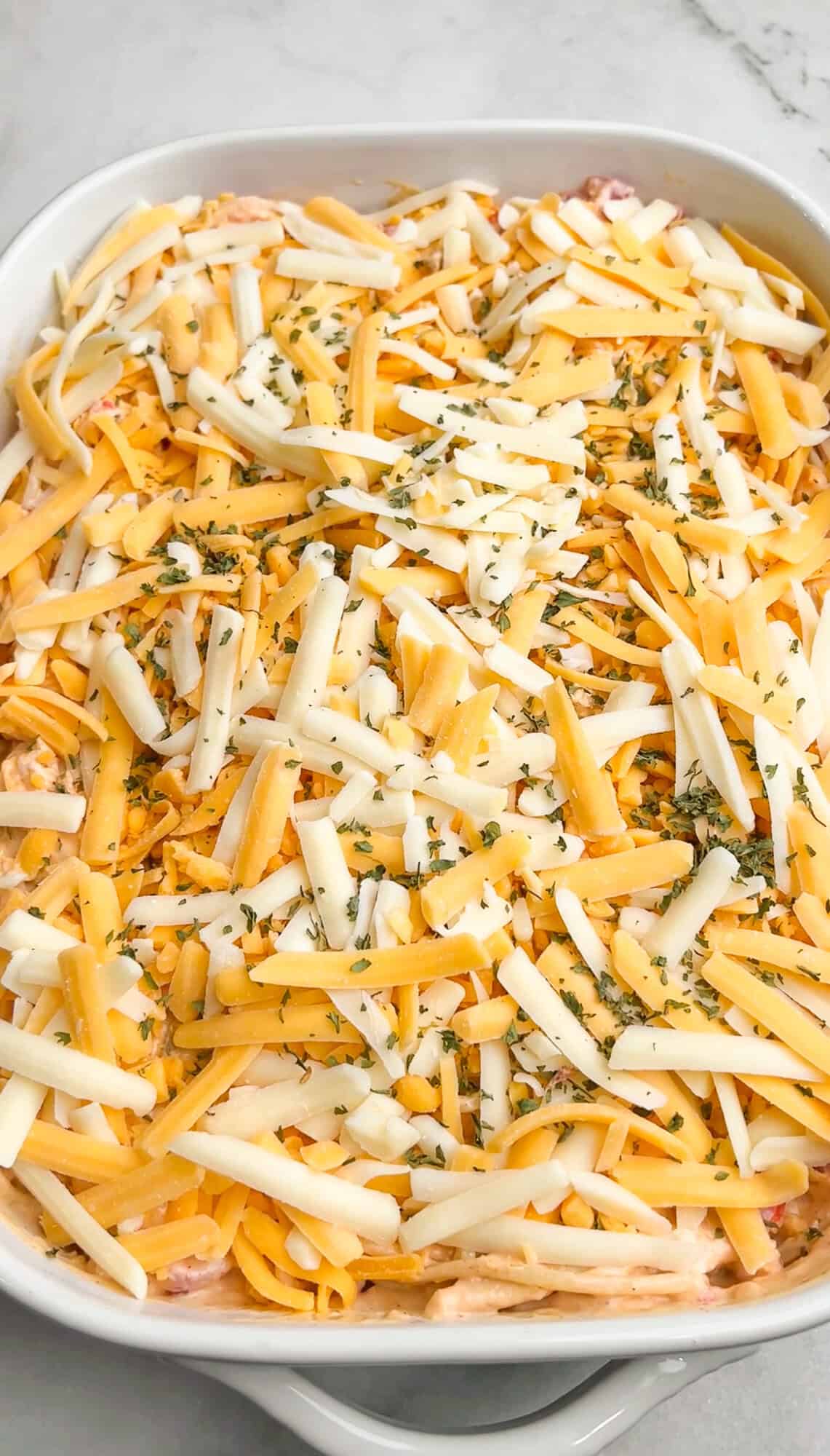 cheese layered over the casserole dish