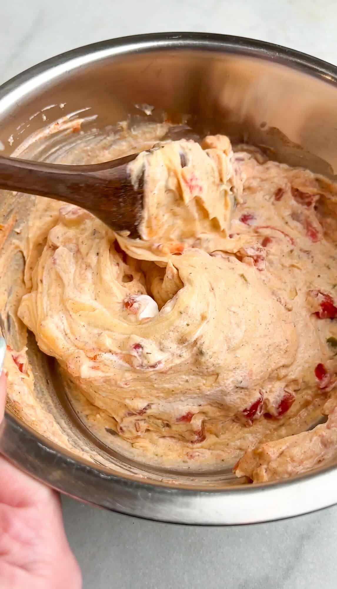 cream sauce being mixed together