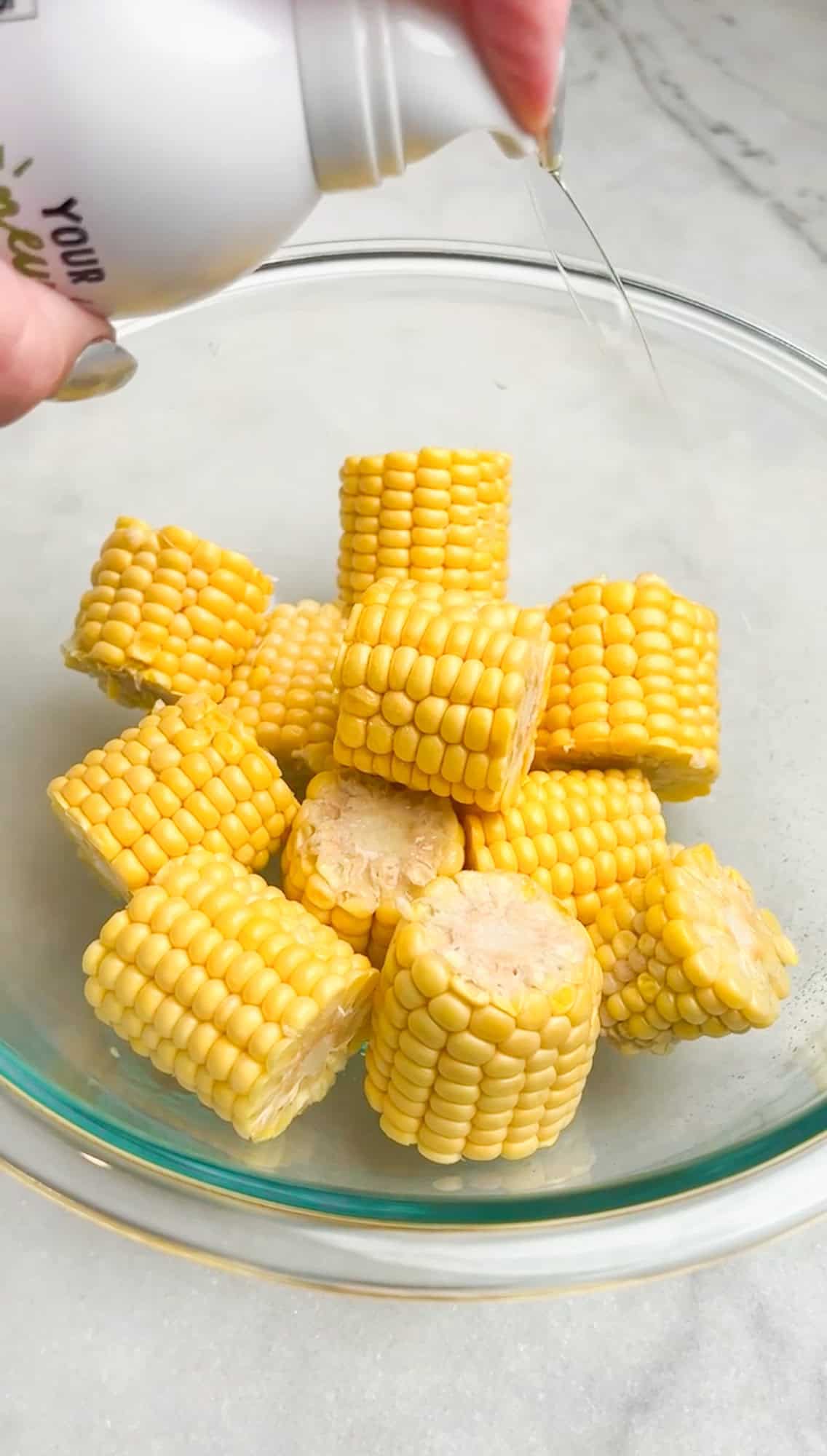 spritzing corn with oil