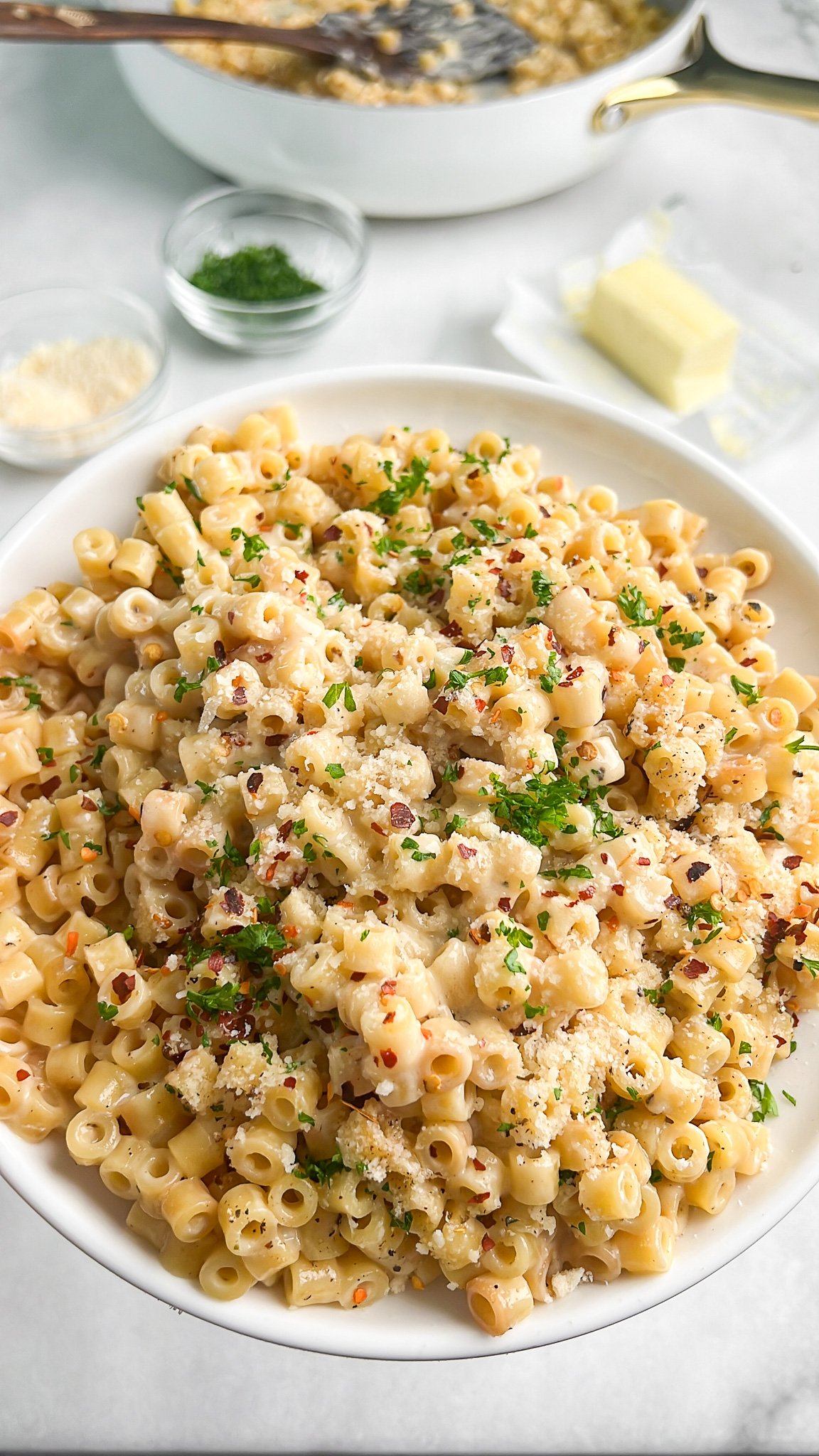 pasta on a plate topped with parsley