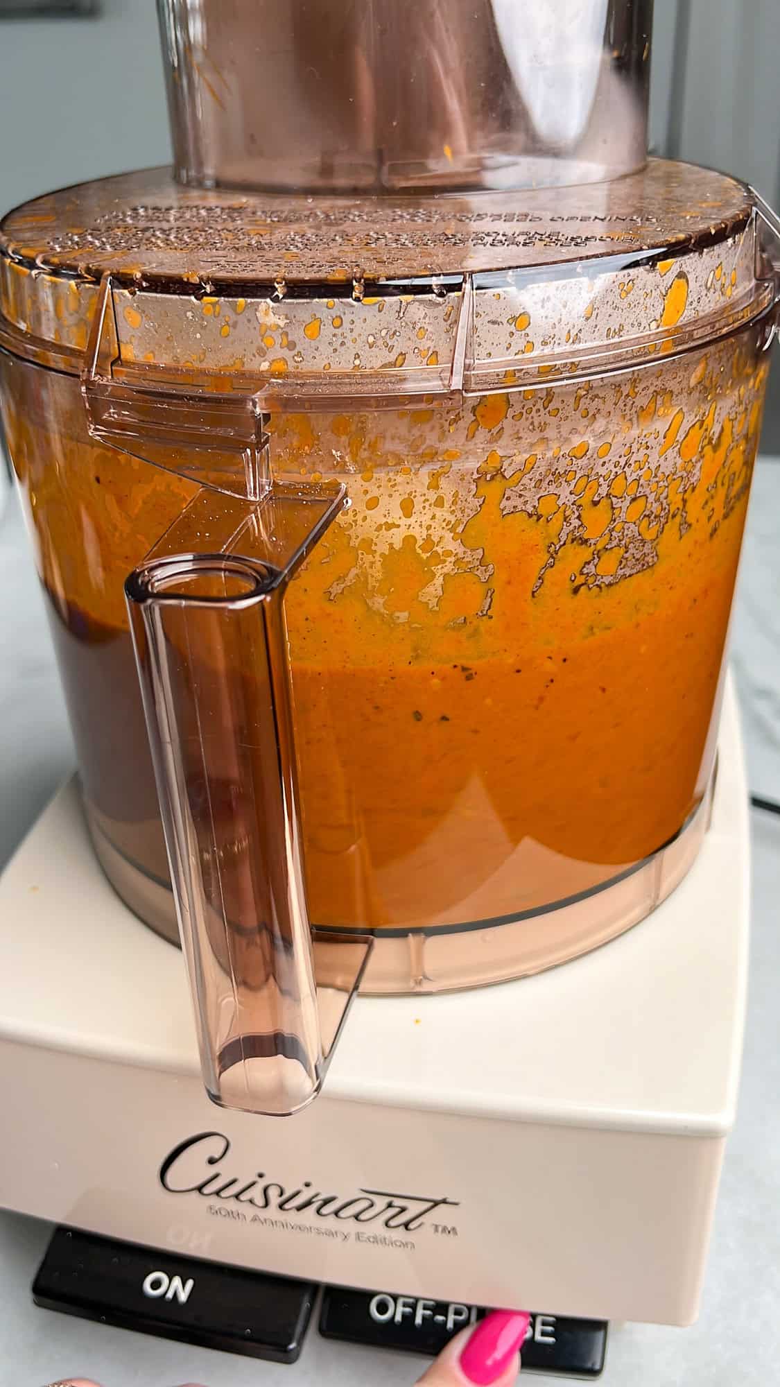 mixture being blended in a food processor