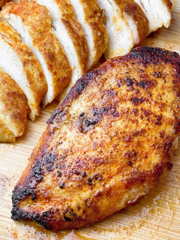 chicken breasts on a cutting board